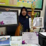 KEPALA MI KHADIJAH MALANG UNGKAP KUNCI KESUKSESAN DULANG RATUSAN PRESTASI