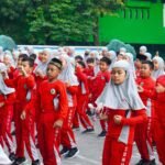 PERINGATI HARI ANAK NASIONAL, SDNU 1 TRATE GRESIK TEKANKAN NASIONALISME SEJAK DINI